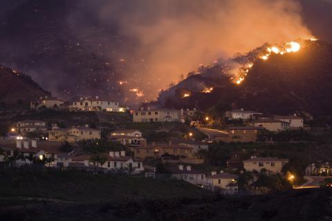 Wildfire quickly approaching homes. Taken during the Santiago fire, October 23 in California. iStock