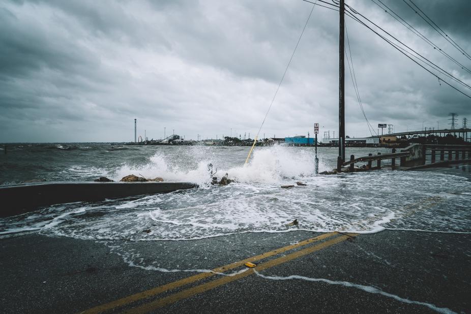 Water crashing over bridge during Hurricane Harvey in Kemah Texas. iStock