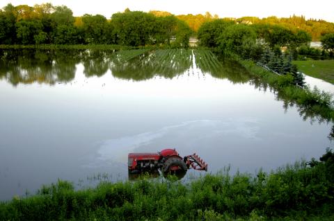 Tractor in flooded area